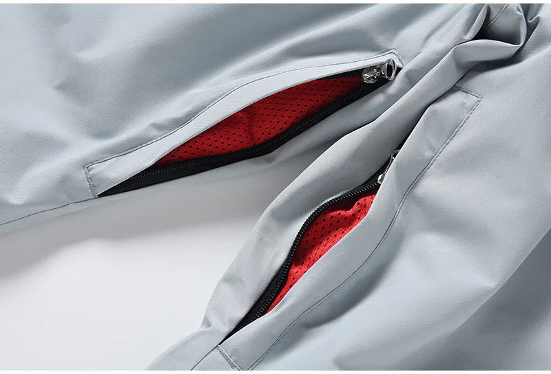 Remi – Unisex Snowboard-Einteiler – Grau