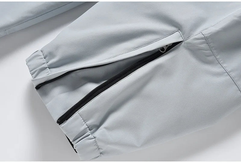 Remi – Unisex Snowboard-Einteiler – Grau