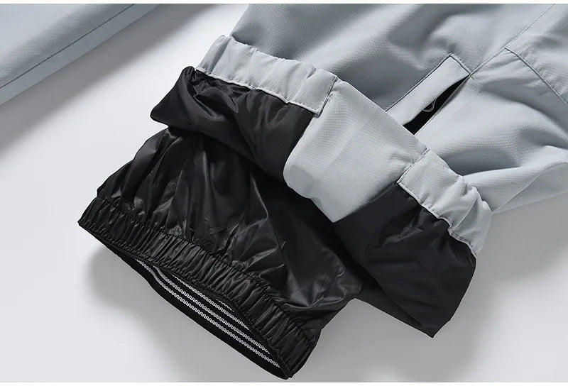 Remi – Unisex Snowboard-Einteiler – Grau